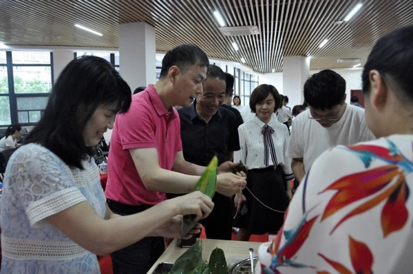 1611646494131852.jpg 南昌市政建設集體我會包粽子大賽600(3).jpg